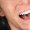 Teeth health concept. Cropped photo of smiling woman mouth under